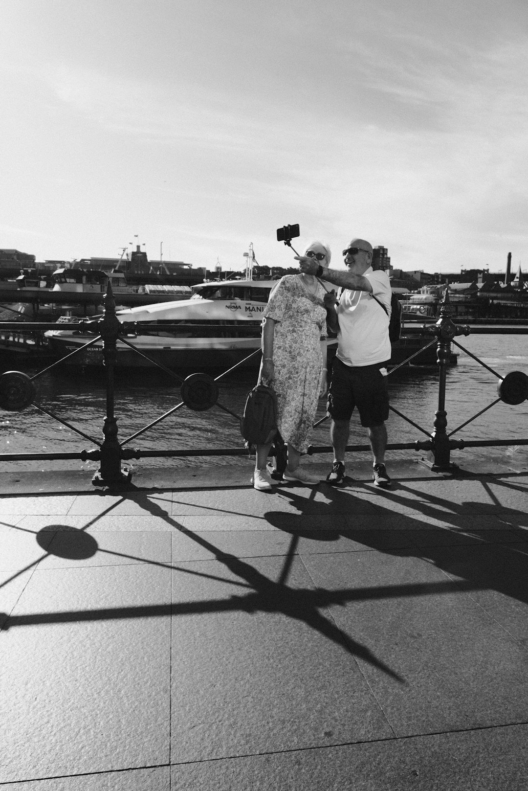 Two Danish documentary photographers standing together with cameras