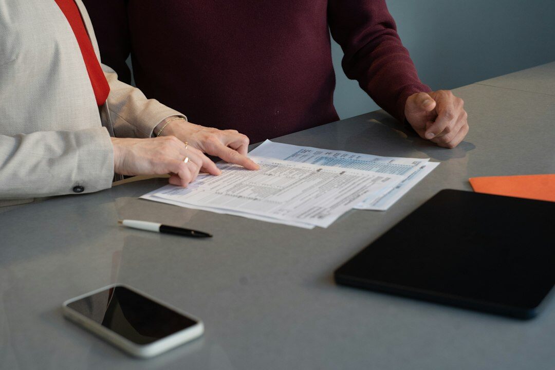 person comparing insurance documents