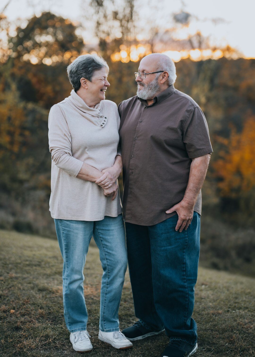 happy elderly couple walking